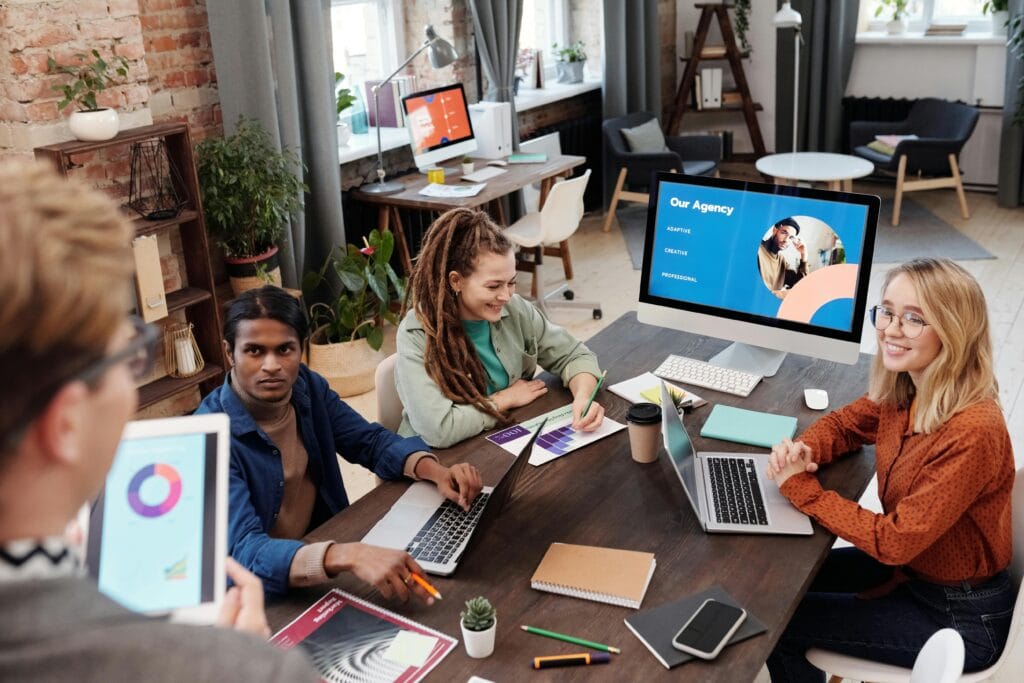 Professional team analyzing social media marketing strategy and performance reports